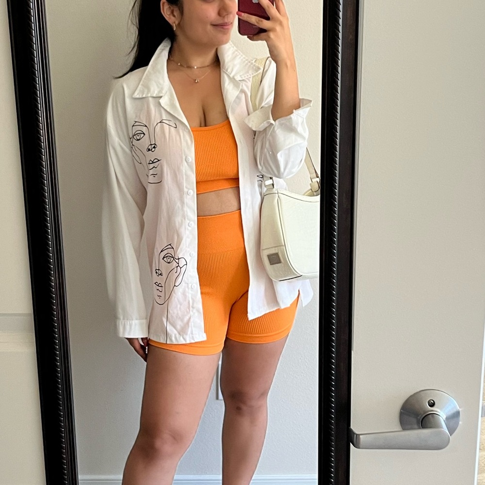 Orange two piece rubbed workout set